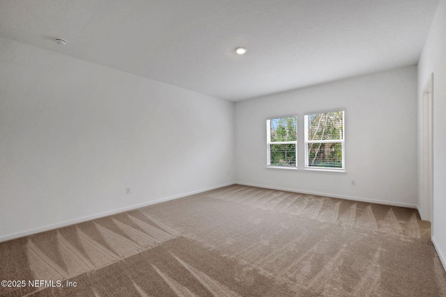 Spacious, unfurnished interior of a new home in TrailMark, St. Augustine (Image 29).