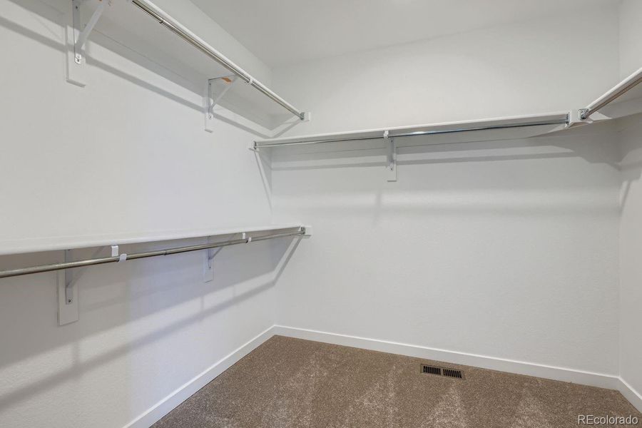 Spacious, unfurnished interior of a new home in Sky Ranch: Pioneer Collection, Watkins (Image 9).