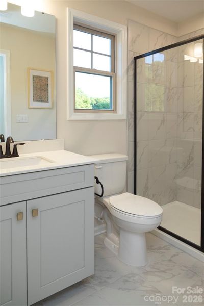 En Suite (Bath Four) Upper Level- Photo is for representation purposes of floorplan only - colors, finishes, and options will vary