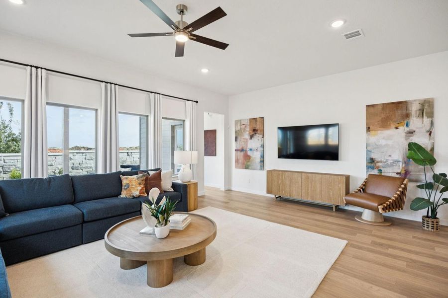 Living Room in the Diamond home plan by Trophy Signature Homes – REPRESENTATIVE PHOTO