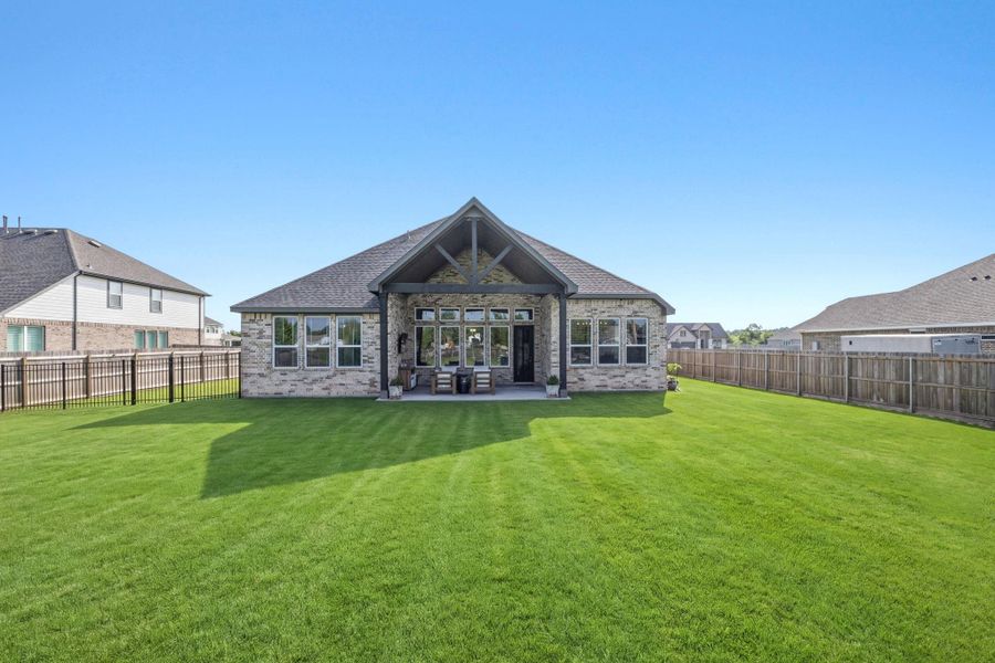 Exterior details and patio area of a home in , Old River-Winfree (Image 3).