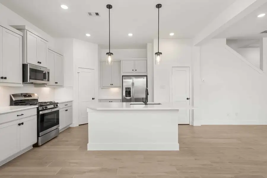 Furnished interior view inside a new home in Santa Rita Ranch, Liberty Hill (Image 5).