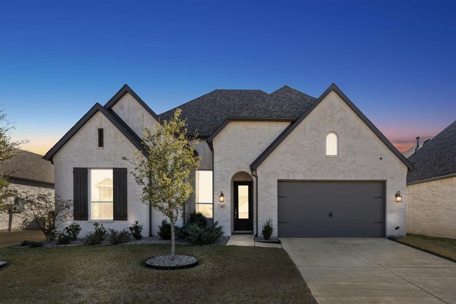 Front exterior of a new home in , Forney, TX, highlighting curb appeal (Image 1). Front exterior of a new home in , Forney, TX, highlighting curb appeal (Image 1).