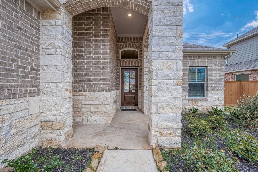 Representative exterior details of a home built from the Floor Plan 1830 by Colina Homes in Grand Magnolia, Magnolia (Image 4). Representative exterior details of a home built from the Floor Plan 1830 by Colina Homes in Grand Magnolia, Magnolia (Image 4).