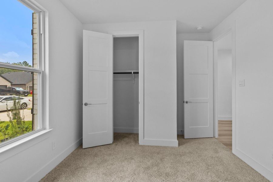 Spacious, unfurnished interior of a new home in Hills of Westlake, Conroe (Image 25). Spacious, unfurnished interior of a new home in Hills of Westlake, Conroe (Image 25).