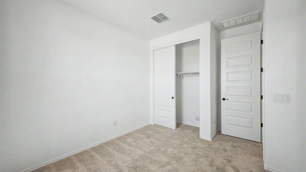Representative furnished interior of a home built from the Acacia II by DRB Homes in Apache Farms, Buckeye (Image 22).