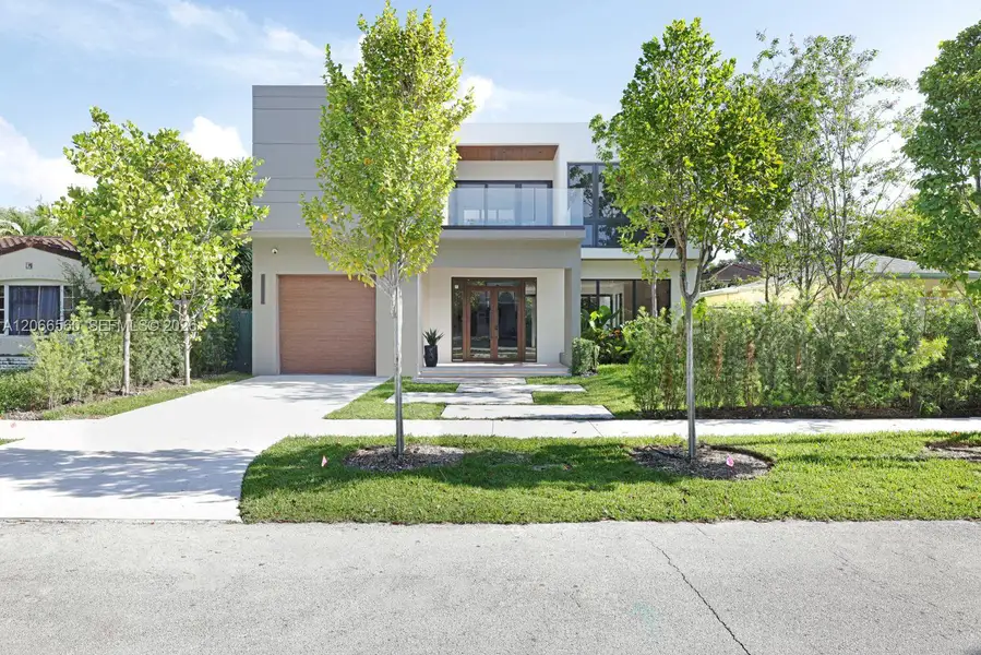 Front exterior of a new home in , Miami, FL, highlighting curb appeal (Image 25). Front exterior of a new home in , Miami, FL, highlighting curb appeal (Image 25).