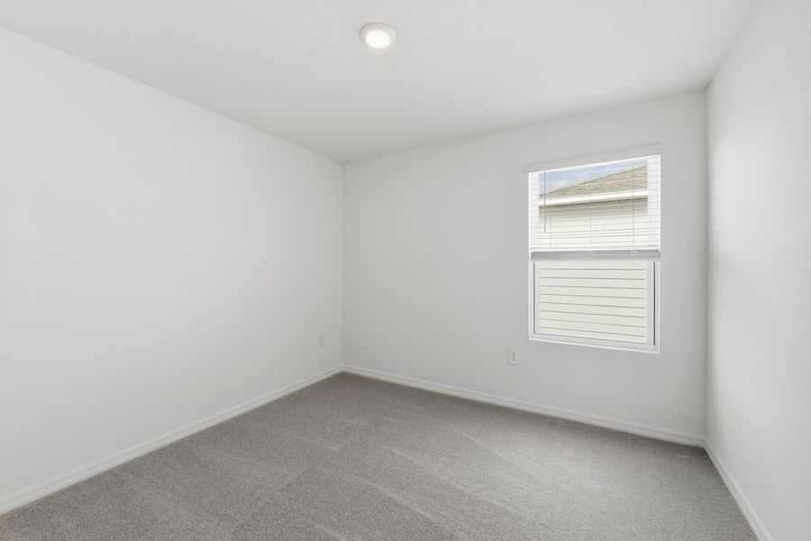 Representative unfurnished interior of a home built from the Redbud by Taylor Morrison in Firethorn, Parrish (Image 13).