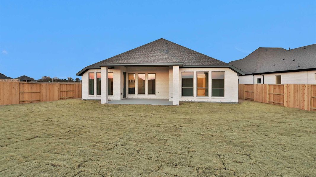 Exterior details and patio area of a home in Meridiana, Manvel (Image 3).