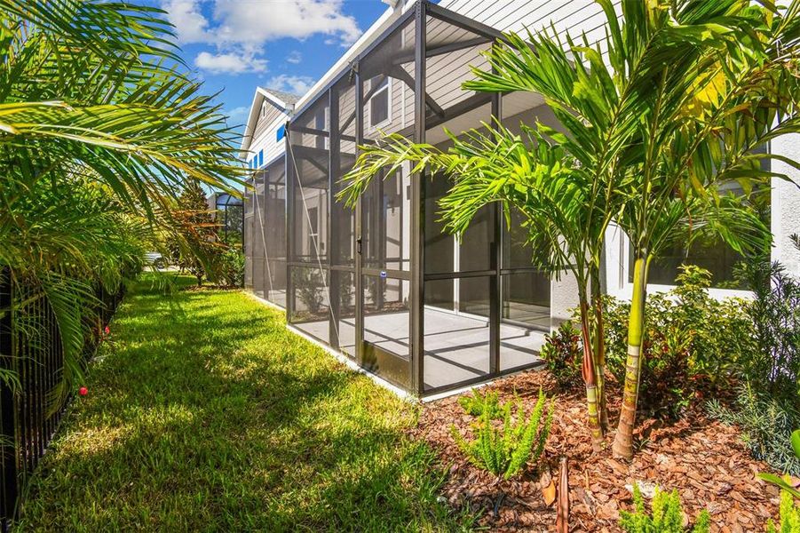 Front exterior of a new home in North River Ranch – Townhomes, Parrish, FL, highlighting curb appeal (Image 1). Front exterior of a new home in North River Ranch – Townhomes, Parrish, FL, highlighting curb appeal (Image 1).