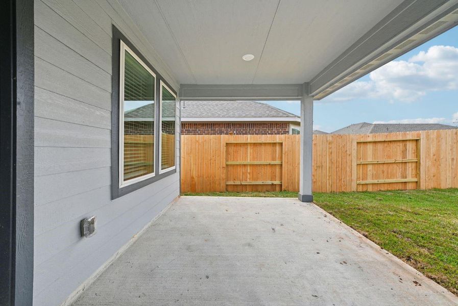 Nice sized covered back patio.