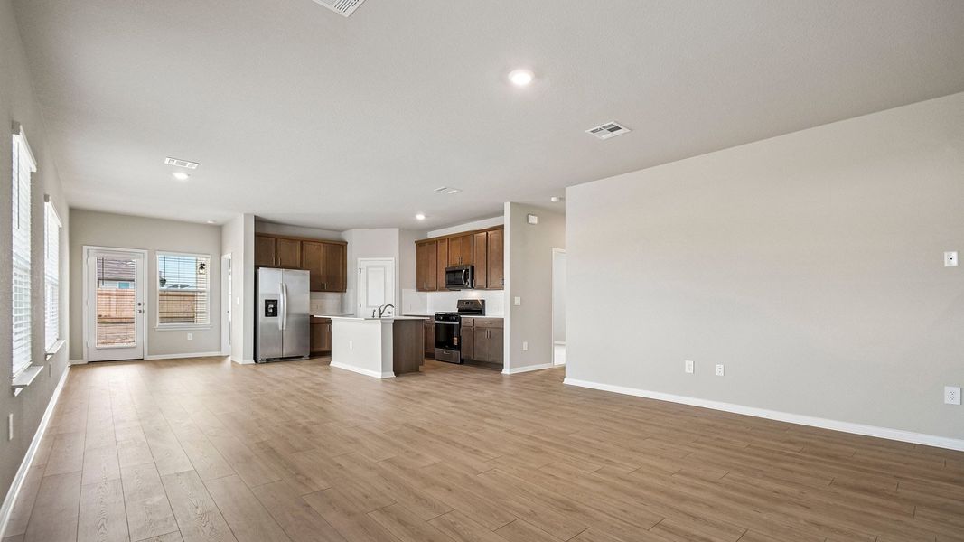 Spacious, unfurnished interior of a new home in Carillon, Manor (Image 14).