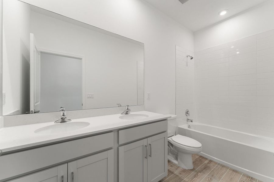 Furnished interior view inside a new home in Tradition - Cadence, Port St. Lucie (Image 5). Furnished interior view inside a new home in Tradition - Cadence, Port St. Lucie (Image 5).