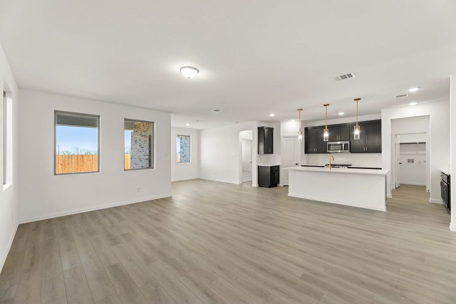 Open Kitchen-Living-Dining Room featuring the Oxford Collection