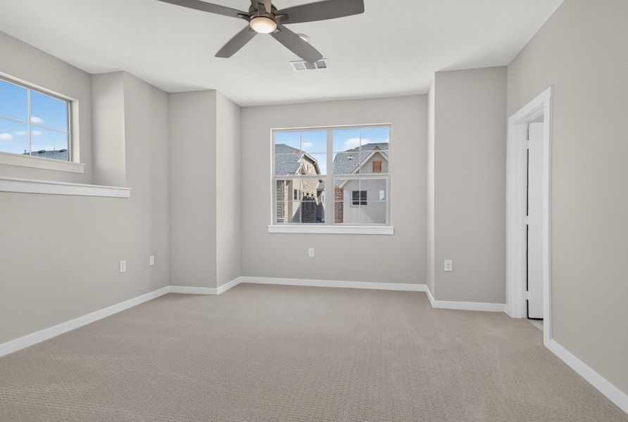 Spacious, unfurnished interior of a new home in The Tribute, The Colony (Image 37).