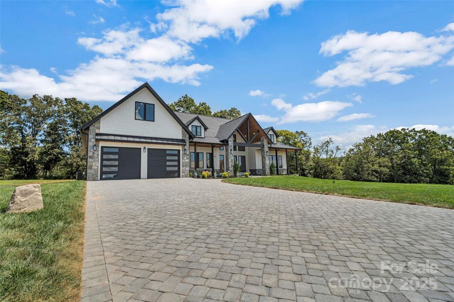 Front exterior of a new home in , Fletcher, NC, highlighting curb appeal (Image 24). Front exterior of a new home in , Fletcher, NC, highlighting curb appeal (Image 24).