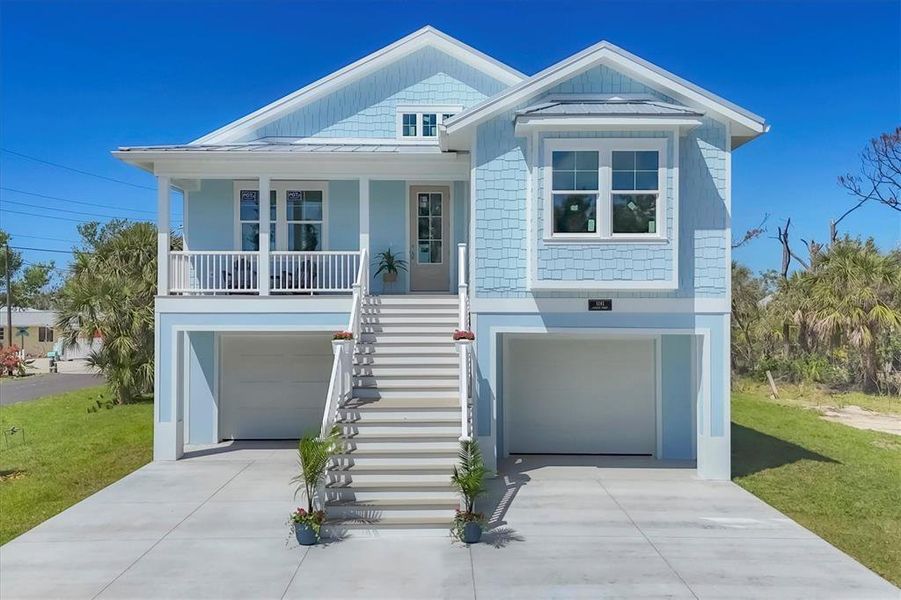 Front exterior of a new home in , Englewood, FL, highlighting curb appeal (Image 28).