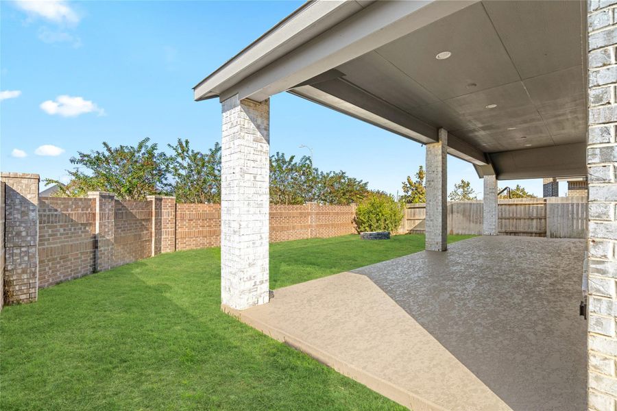 Extended Covered Patio: Massive covered area perfect for year-round entertaining and outdoor dining.