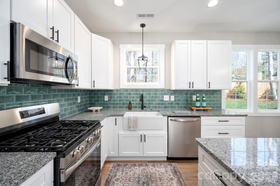 Beautifully Finished Kitchen with Granite Counters