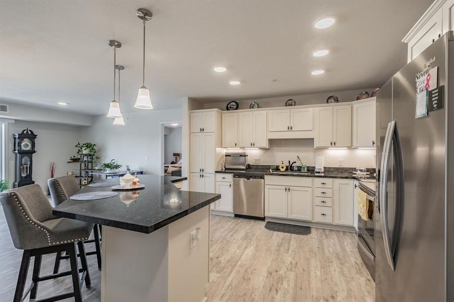 Plenty of cabinet space for kitchen storage.