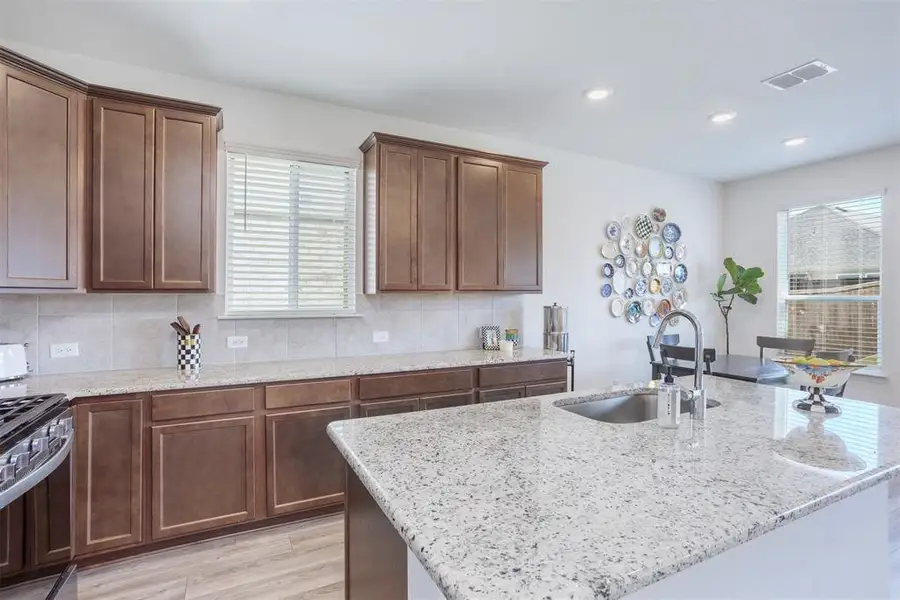 Furnished interior view inside a new home in , Anna (Image 10). Furnished interior view inside a new home in , Anna (Image 10).