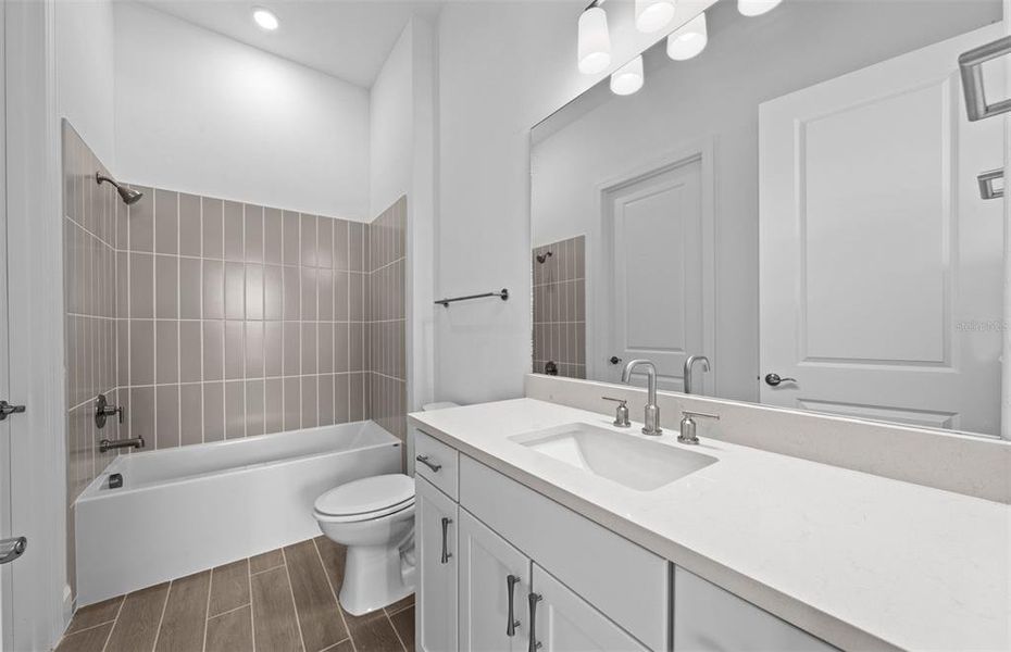 Furnished interior view inside a new home in BeachWalk by Manasota Key, Englewood (Image 11).