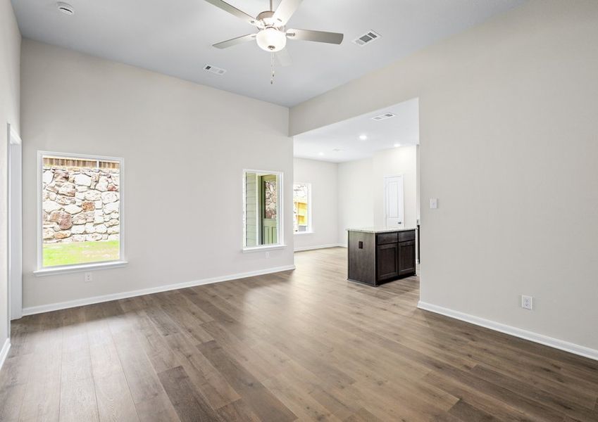 The family room has large windows that let in great, natural light. The family room has large windows that let in great, natural light.