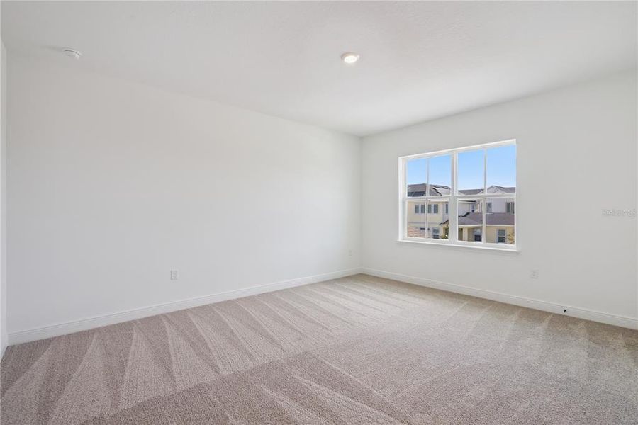 Spacious, unfurnished interior of a new home in Laureate Park, Orlando (Image 41).