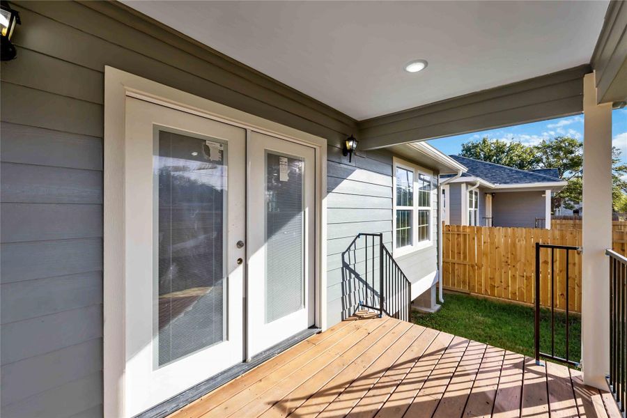 Covered patio overlooking the fully fenced backyard Covered patio overlooking the fully fenced backyard