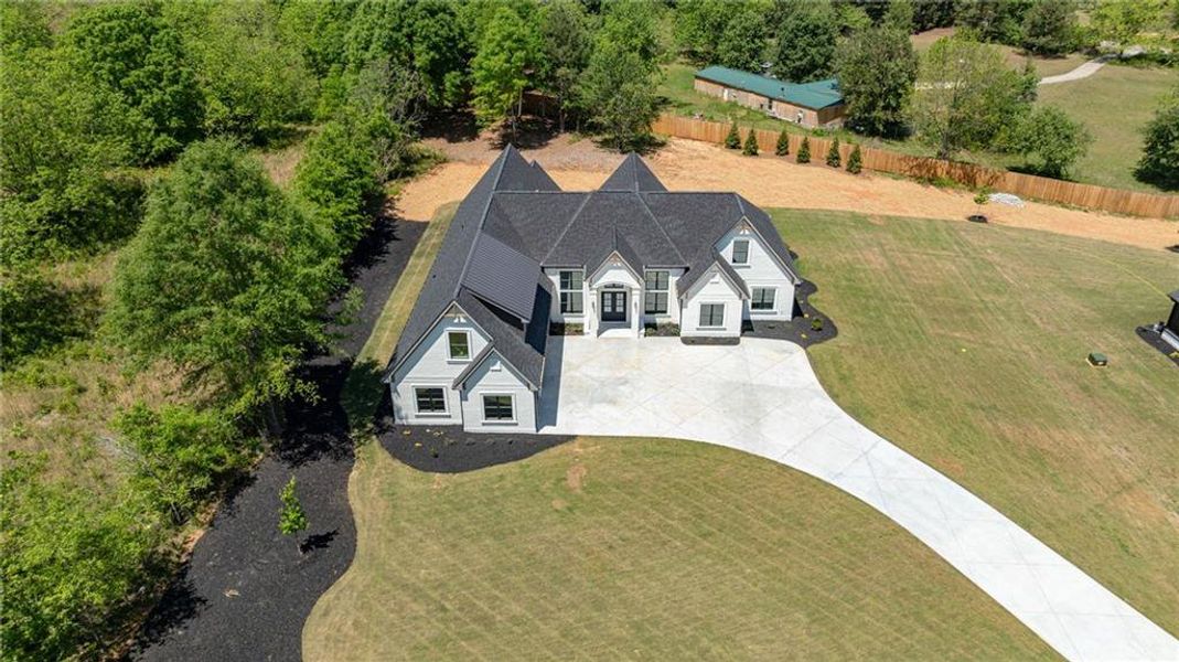 Front exterior of a new home in , Monroe, GA, highlighting curb appeal (Image 33).