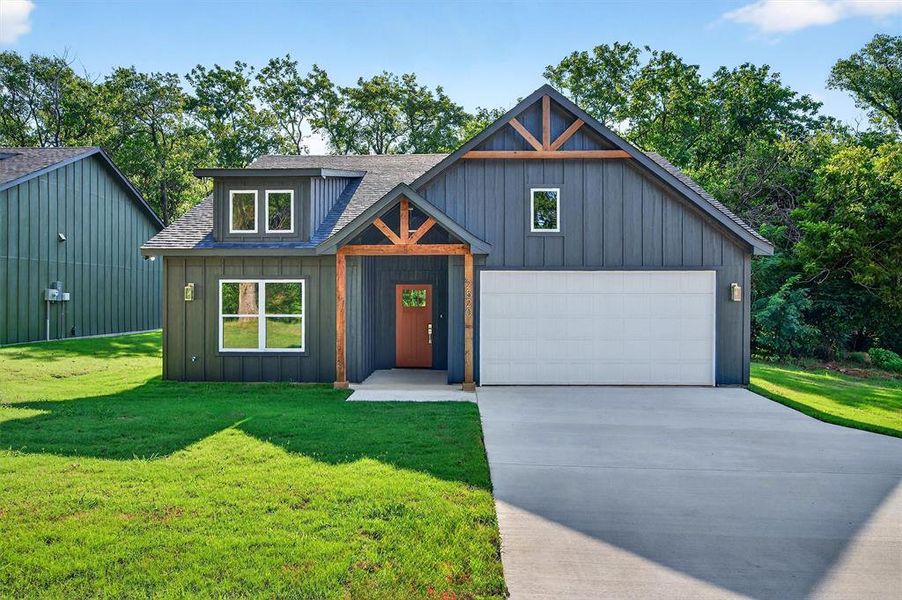 Front exterior of a new home in , Denison, TX, highlighting curb appeal (Image 21). Front exterior of a new home in , Denison, TX, highlighting curb appeal (Image 21).
