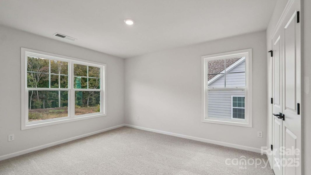 Spacious, unfurnished interior of a new home in Falls Cove, Troutman (Image 40).