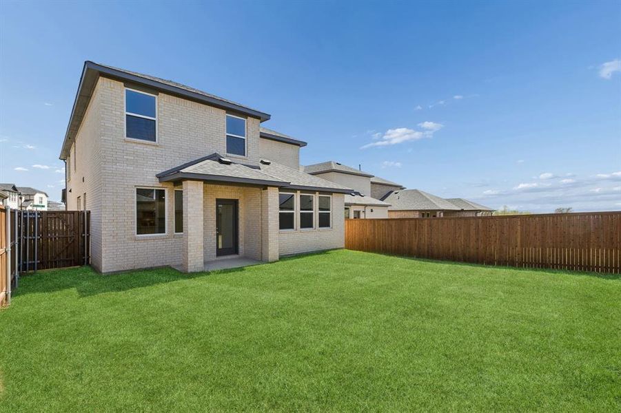 Exterior details and patio area of a home in Bellagio, Forney (Image 3).