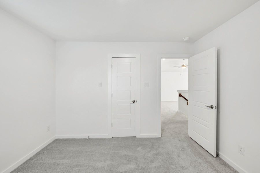 Spacious, unfurnished interior of a new home in Ambrose, La Marque (Image 24).