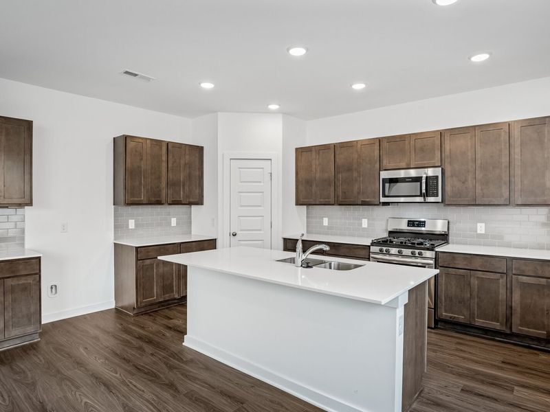 Furnished interior view inside a new home in Sage Farms, White House (Image 8).