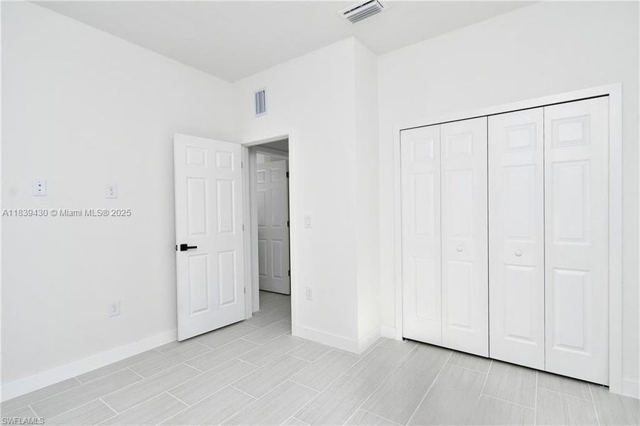 Spacious, unfurnished interior of a new home in , Lehigh Acres (Image 16).