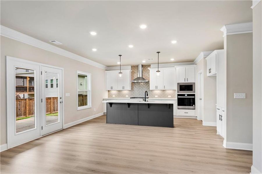 Furnished interior view inside a new home in Hidden Fields, Hoschton (Image 8).