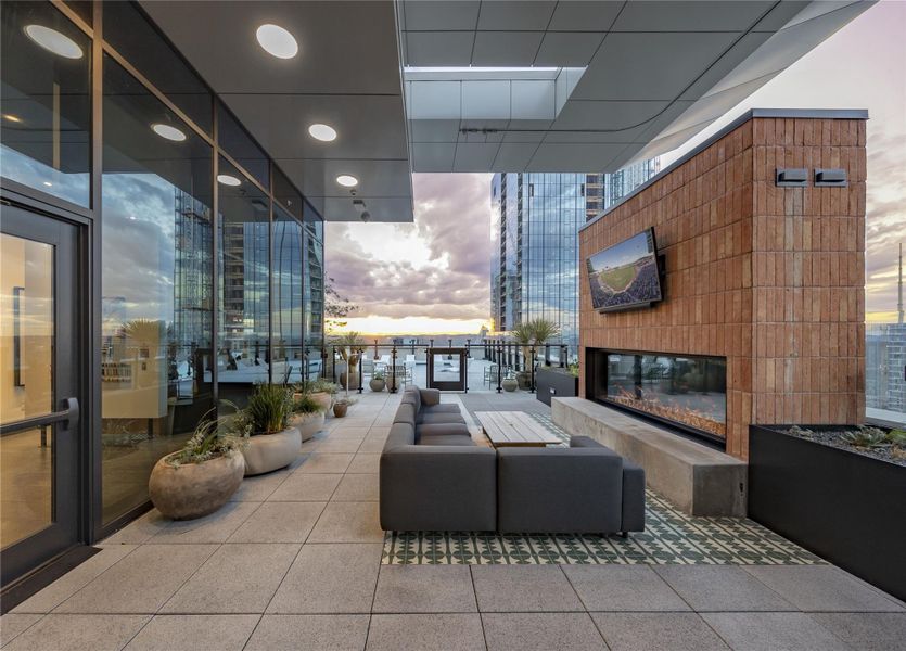 Cozy up by the rooftop fireplace.