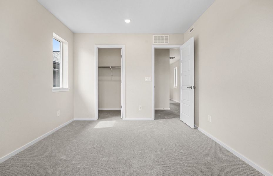 Spacious, unfurnished interior of a new home in Barefoot Village, Firestone (Image 17). Spacious, unfurnished interior of a new home in Barefoot Village, Firestone (Image 17).