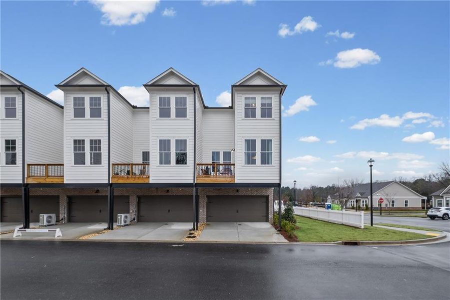 Front exterior of a new home in , Canton, GA, highlighting curb appeal (Image 2). Front exterior of a new home in , Canton, GA, highlighting curb appeal (Image 2).
