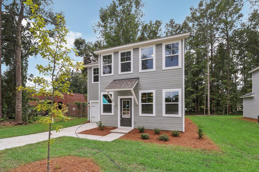 Exterior details and patio area of a home in Founder's Park, Lincolnville (Image 16). Exterior details and patio area of a home in Founder's Park, Lincolnville (Image 16).