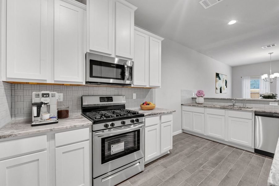 Representative furnished interior of a home built from the Floor Plan 1774 by Colina Homes in Rollingbrook Estates, Baytown (Image 8).