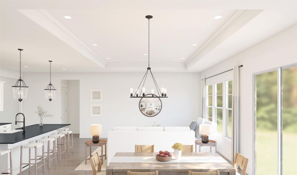 Sun-lit dining area with ceiling treatment (*Artist rendering used for illustration purposes only.)