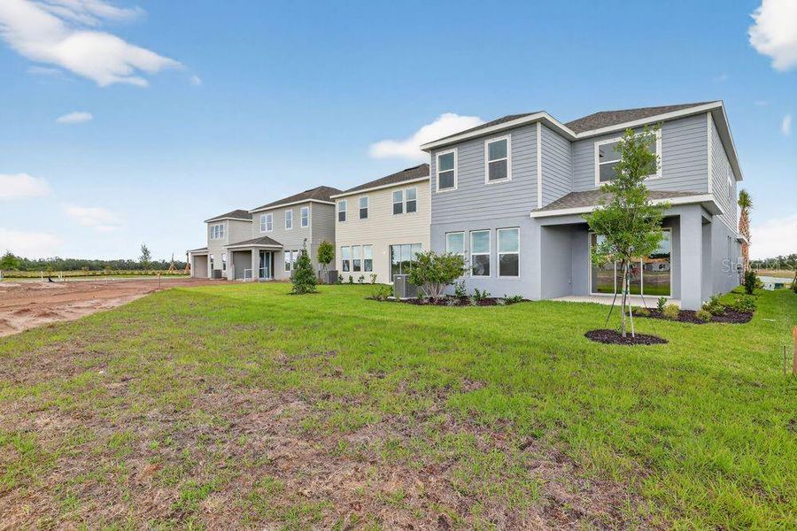 Exterior details and patio area of a home in Firethorn, Parrish (Image 23).