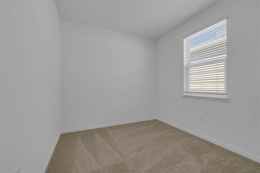 Spacious, unfurnished interior of a new home in Brack Ranch, St. Cloud (Image 31).
