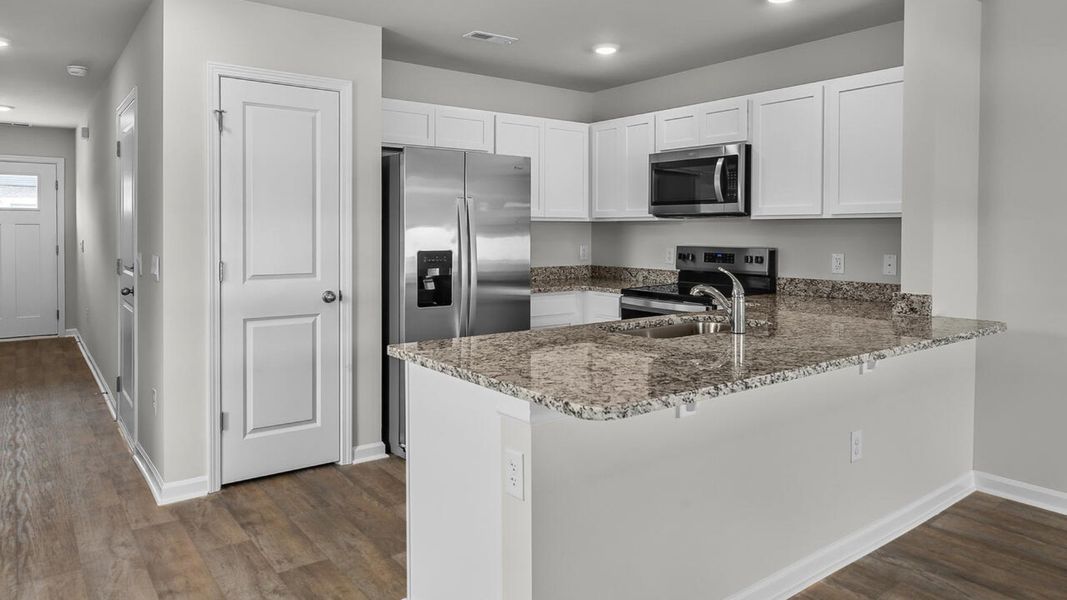 Furnished interior view inside a new home in Townes at Seabrooke, Leland (Image 6). Furnished interior view inside a new home in Townes at Seabrooke, Leland (Image 6).