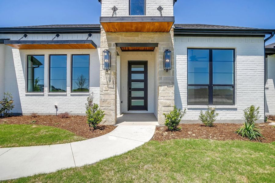 Representative exterior details of a home built from the The Avery by Elmwood Custom Homes in Matthews Farm, Venus (Image 13). Representative exterior details of a home built from the The Avery by Elmwood Custom Homes in Matthews Farm, Venus (Image 13).