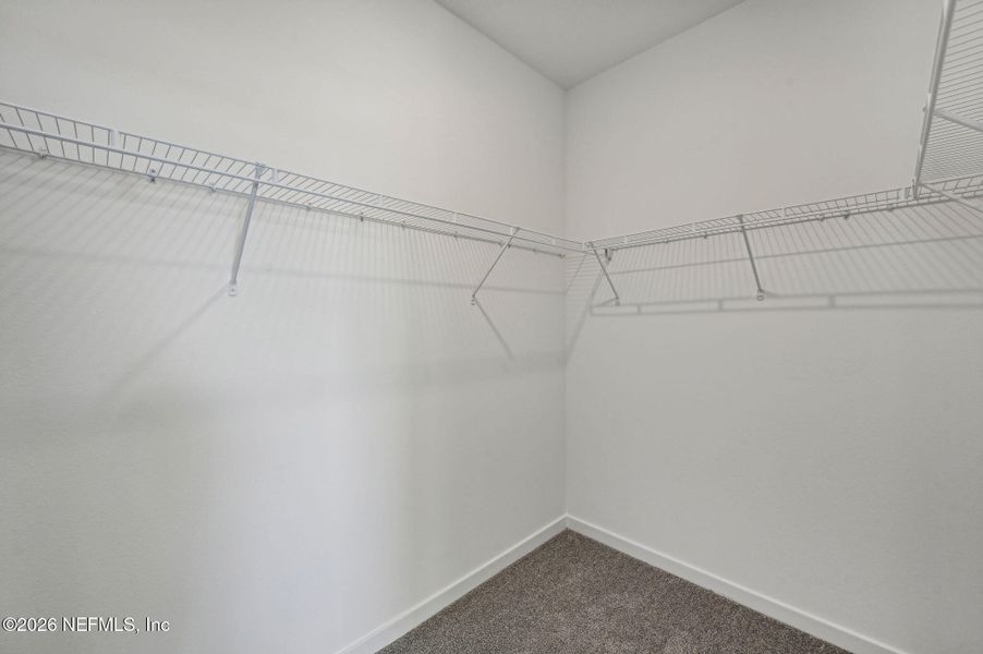 Spacious, unfurnished interior of a new home in Lakes at Bella Lago - Signature Series, Green Cove Springs (Image 31).