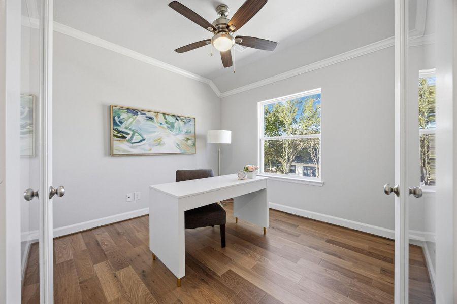 Functional Luxury: The study, an optimal blend of size and elegance, creates a productive yet serene home office atmosphere.