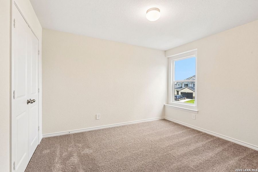 Spacious, unfurnished interior of a new home in Woodside Farms, Seguin (Image 18).